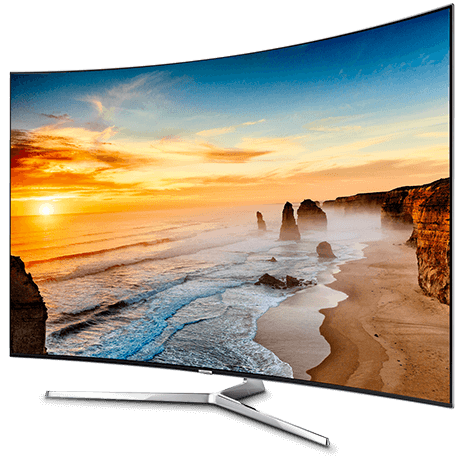 Curved 4K TV displaying a stunning sunset over a rocky beach, offering an immersive viewing experience