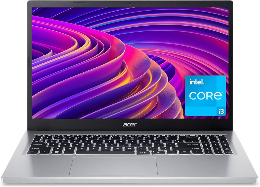 Acer laptop with Intel Core i3, featuring vibrant purple and gold abstract display, silver keyboard and large touchpad