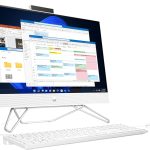 All-in-one desktop PC with open calendar and files, sleek white keyboard and mouse on display
