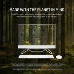 Eco-friendly AIO computer with sustainable materials, featuring ocean-bound and recycled plastics, in a forest setting