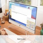 Modern desktop computer on wooden desk with an email open, text reads Built to last