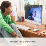 Person enjoying vibrant video on a modern desktop computer, showcasing immersive full HD entertainment experience