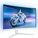 Curved monitor displaying futuristic motorcycle in motion, showcasing vivid colors and sleek design