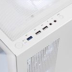 Close-up of a white PC case front panel with USB ports, audio jacks, power, and reset buttons on a perforated surface
