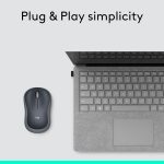 Wireless mouse and laptop on a desk, showcasing plug and play simplicity. Perfect for easy computer setup