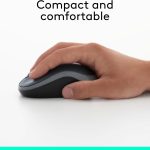 Hand holding a sleek, black ergonomic computer mouse on a white surface, emphasizing comfort and compact design